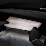 A cabin air filter being installed