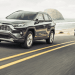 Two Toyota RAV4s on a Road