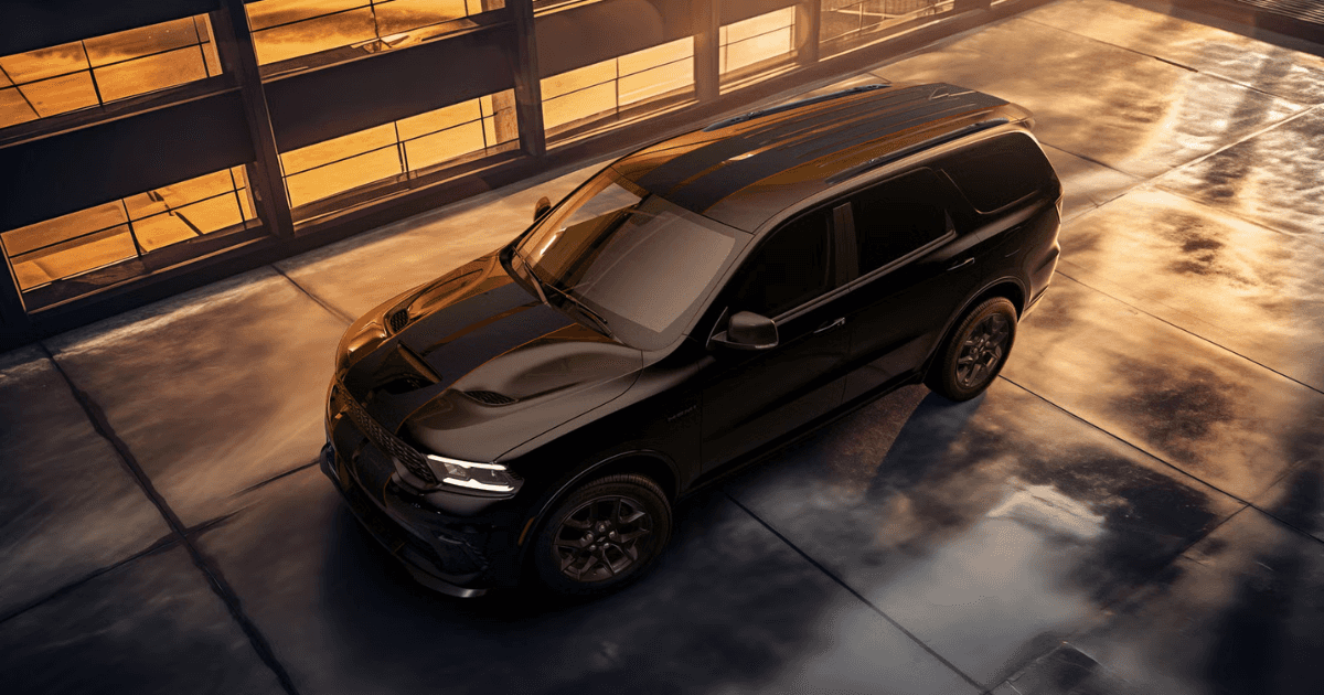 2026 Dodge Durango with HEMI V8 at night with fog and soft lighting 
