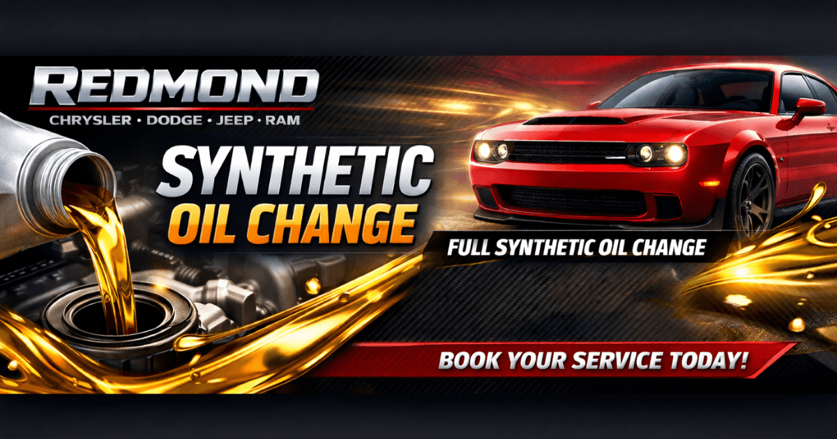 Synthetic oil change during a gold colored oil with a red dodge in the background