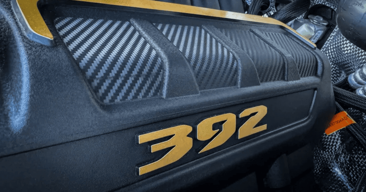 a yellow and black motor cover for the 2026 Jeep Wrangler Willys 392